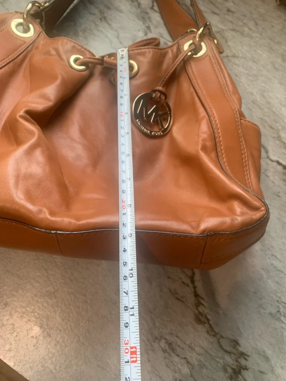 Michael Kors Ludlow Cognac Leather Drawstring Shoulder Bag with Gold Accents - Picture 14 of 16